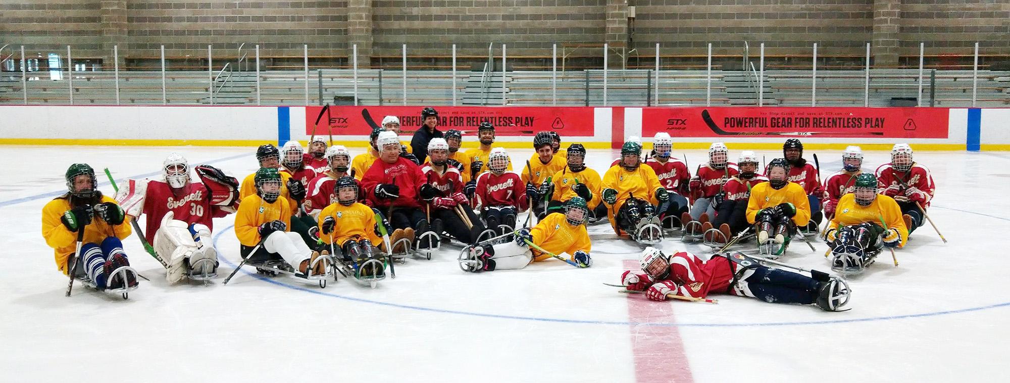 Group photo, sled hockey players